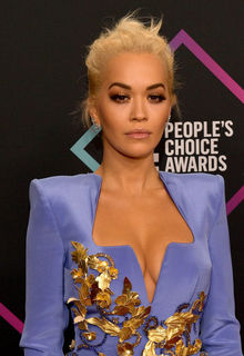 Blonde Rita Ora sexy cleavage in blue dress Blonde Rita Ora sexy cleavage in blue dress