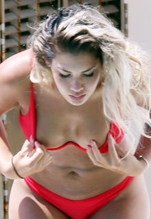 Noni Janur areola slip in red bikini in Sydney - February 12, 2018 Noni Janur areola slip in red bikini in Sydney - February 12, 2018