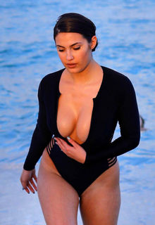 Busty Tao Wickrath in black swimsuit on the beach in Miami - January 07, 2019 Busty Tao Wickrath in black swimsuit on the beach in Miami - January 07, 2019