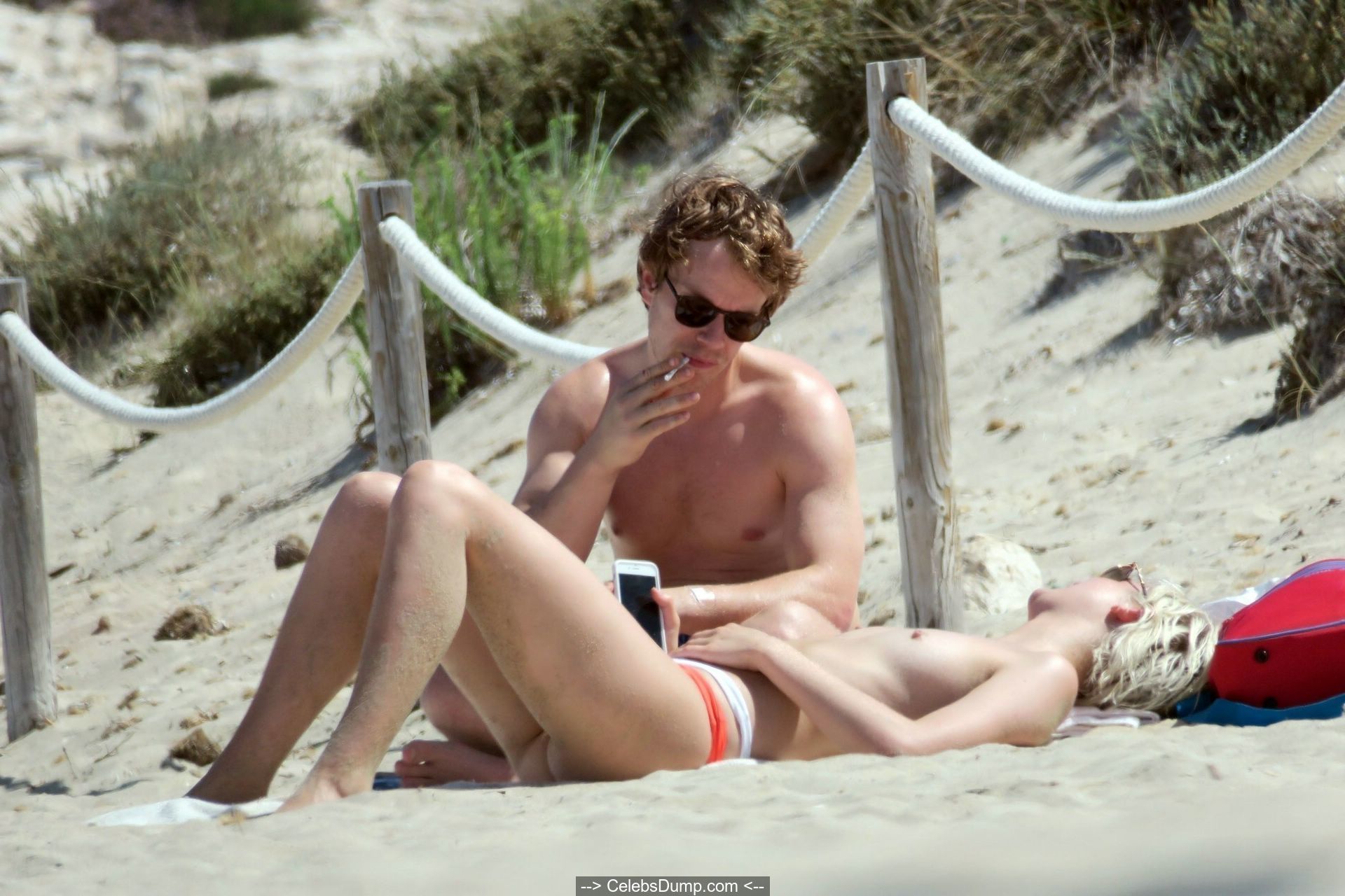 Teliz Alley girlfriend of Alfie Allen nude tits on a beach in Formentera - ...