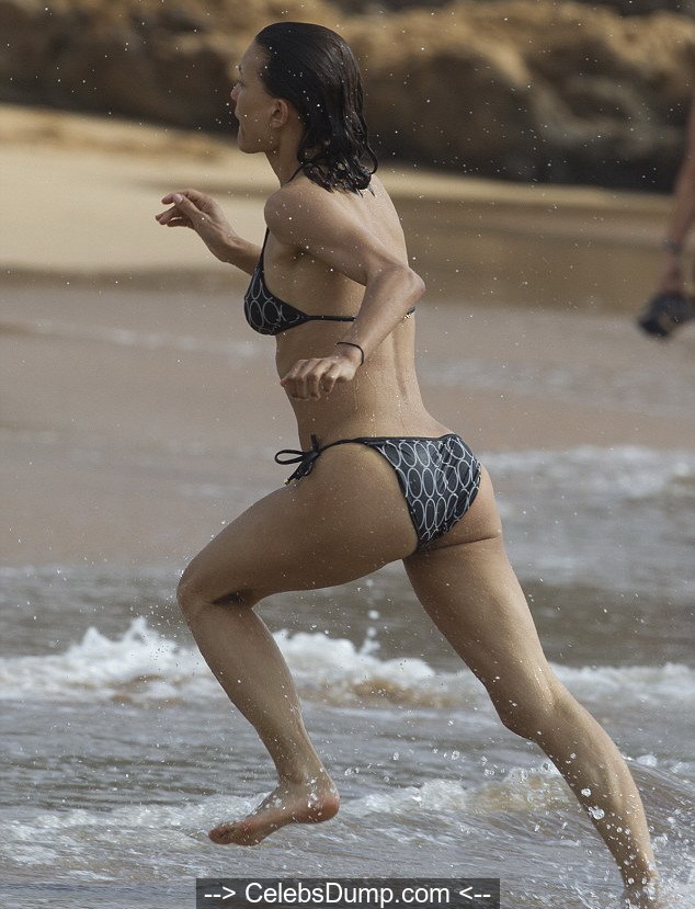 Julia Jones wearing a bikini on a beach in Hawaii - June 2015.