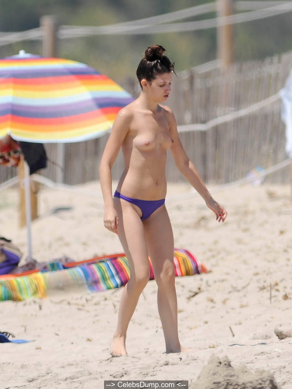 Spanish actress Ursula Corbero topless on a beach paparazzi pictures.