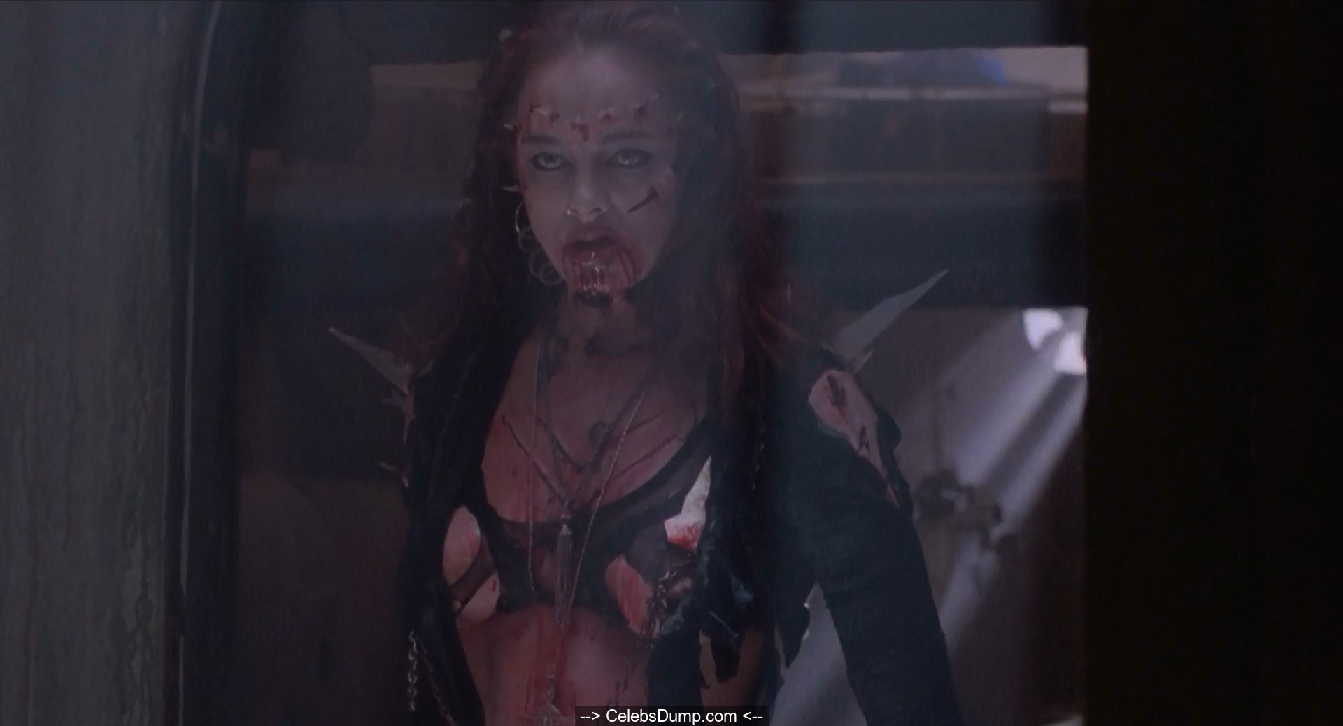Melinda Clarke topless at Return of the Living Dead III (1993) .