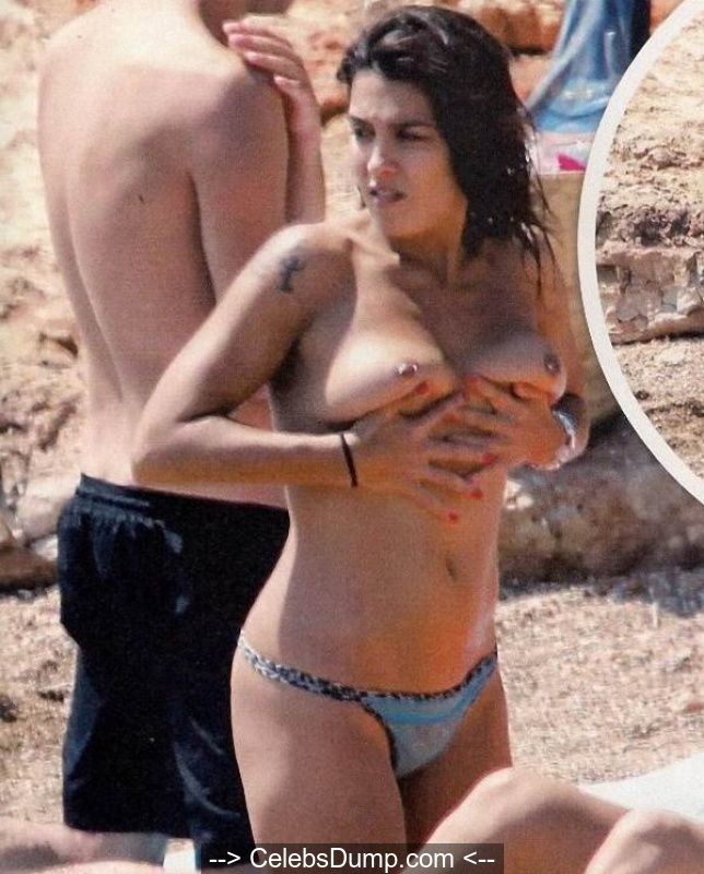 Spanish actress Lorena Castell shows her nude tits on a beach paparazzi pic...
