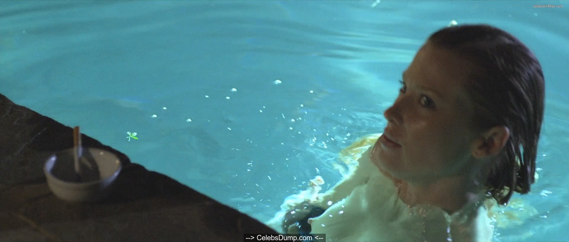 Emma Booth topless in a pool at Swerve (2011) .