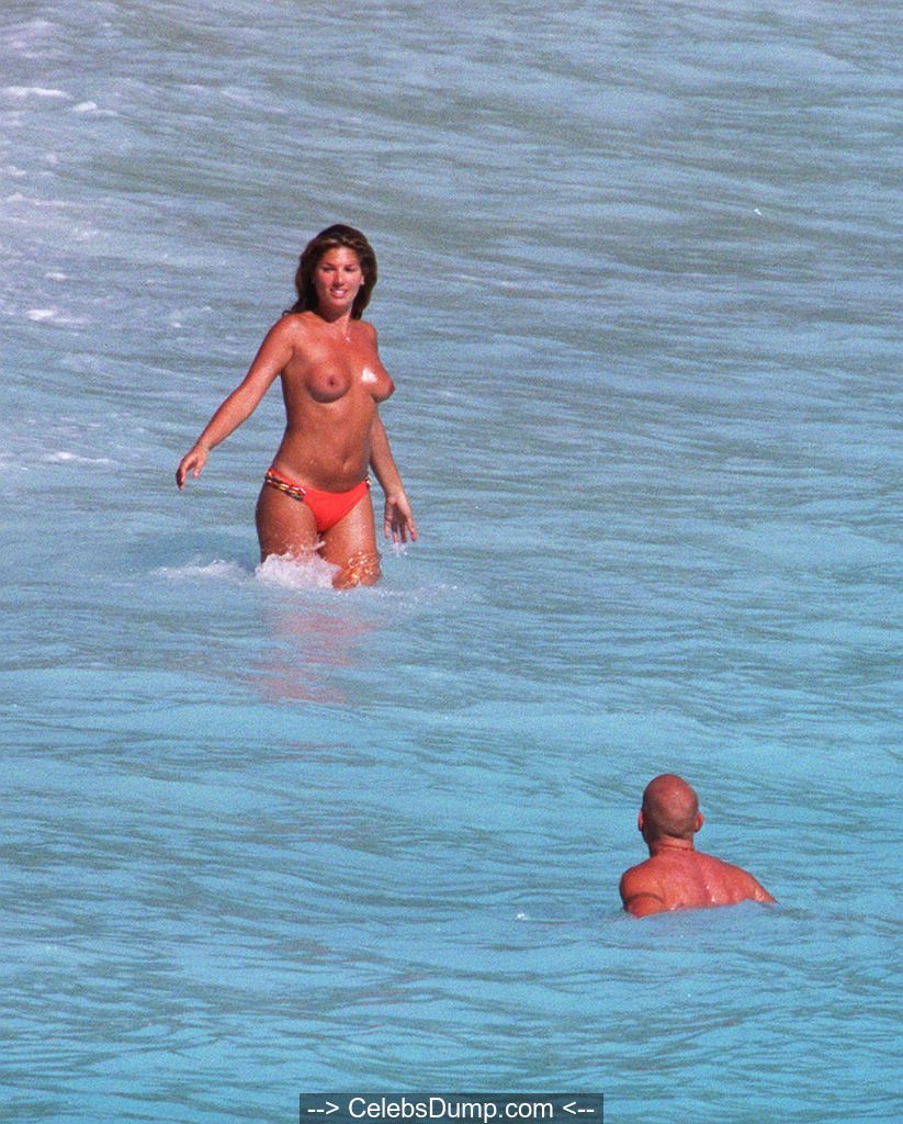 celebsdump.com Daisy Fuentes topless in red bikini pants paparazzi shots Ce...