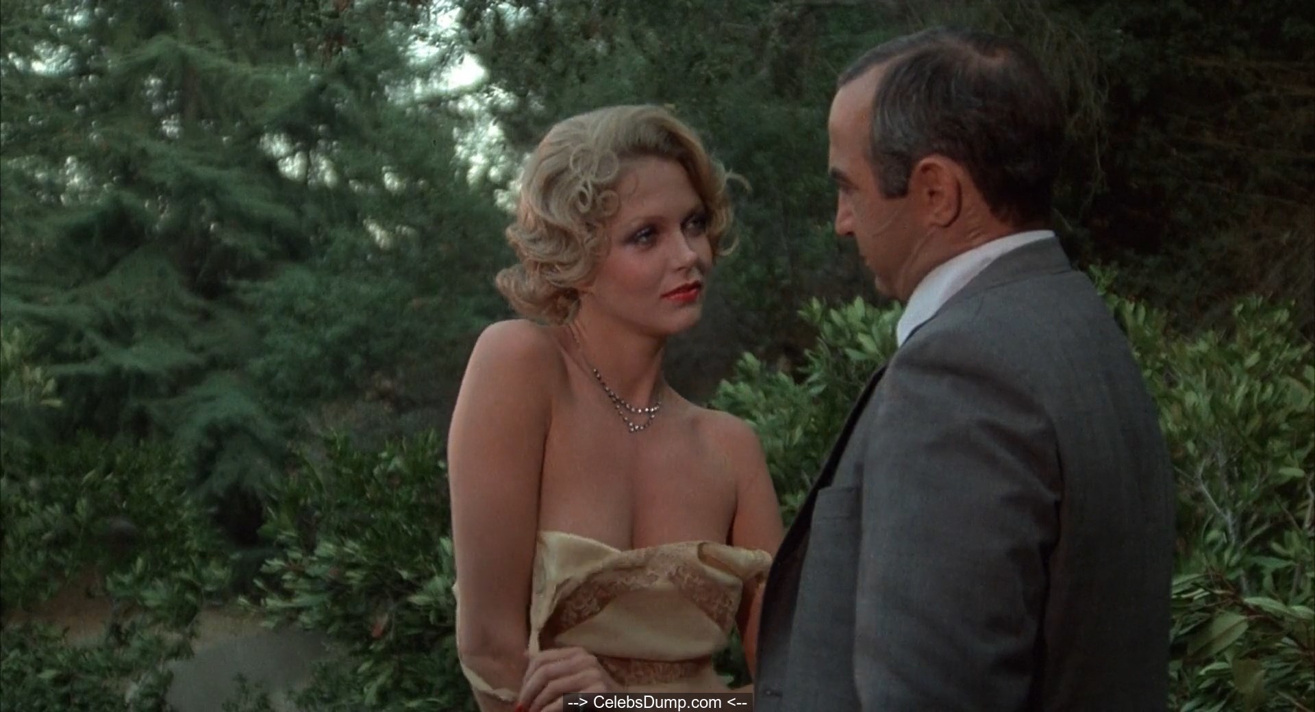 Susan Blakely topless and nude at Capone (1975) .