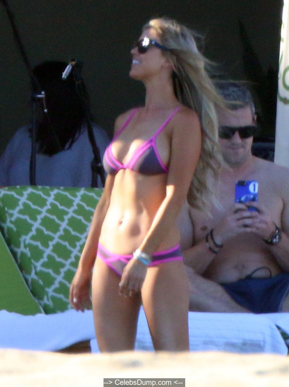 Christina El Moussa and Ant Anstead enjoy a day while sunbathing poolside d...
