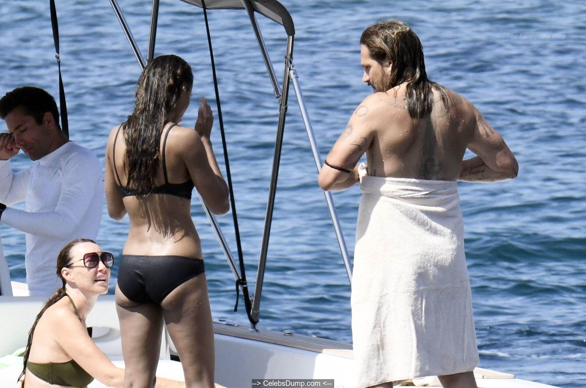 Zoe Saldana topless on yacht in Italy paparazzi photos - August 16, 2021.