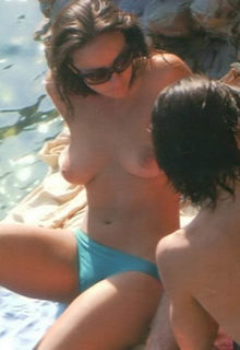 Camila Raznovich topless on a beach paparazzi shots