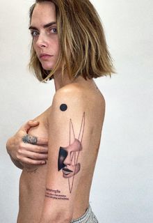 Cara Delevingne topless but covred for The White Whale Tattoo Society - September 2023