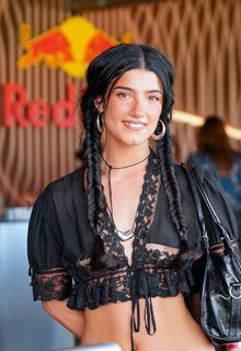Charli D'Amelio areola slip at Red Bull Mirage at the Coachella Valley Music and Arts Festival in Indio - April 11, 2025