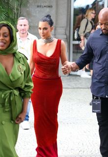Kim Kardashian braless in see through red dress at Copacabana Palace in Rio de Janeiro - November 11, 2025
