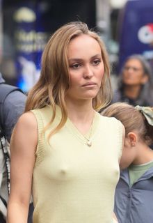Lily-Rose Depp pokies in yellow mini dress while leaving Global Studios, Heart Breakfast Show in London - December 05, 2024