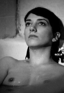 Sheila Vand naked at A Girl Walks Home Alone at Night (2014)