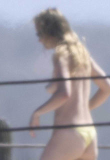 Olivia Wilde soaking up in the sun topless in Mexico - February 11, 2026