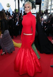 Adriana Karembeu in red dress at La Bataille de Gaulle L'Age de Fer in Cannes May 20, 2026