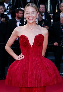 Jaime King in red dress at Bitter Christmas premiere during the 79th Cannes Film Festival in France - May 19, 2026