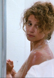 Nancy Travis naked at Internal Affairs (1990)