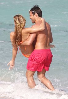 Joanna Krupa in orange bikini on the beach in Miami - January 13, 2011